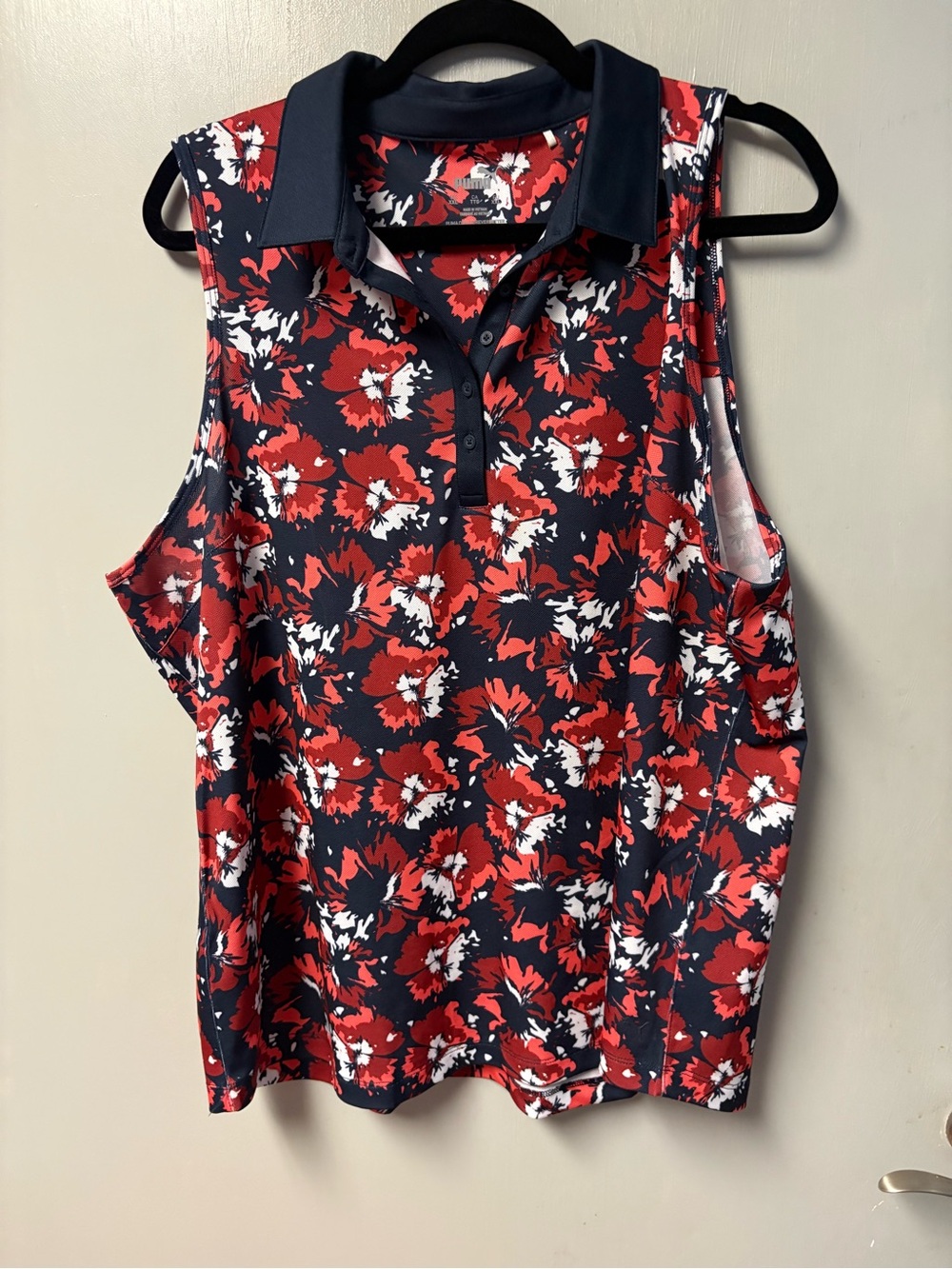 Puma Women’s golf shirt XXL.